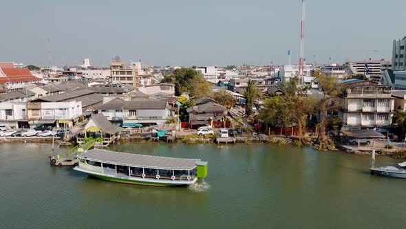 MAEKLONG THAILAND DECEMBER 15 2019 Amazing Aerial View of Maeklong Cityscape with River and Railway alt