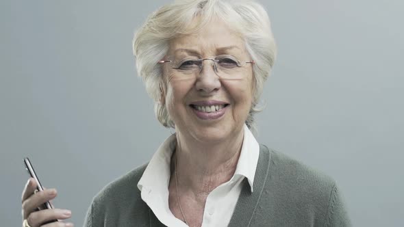 Smiling senior female doctor with stethoscope