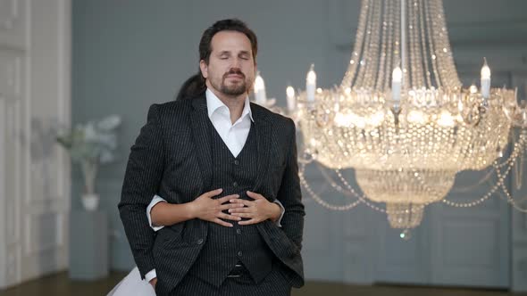 Woman is Hugging Her Beloved Man in Wedding Day Happy Bride and Groom alt