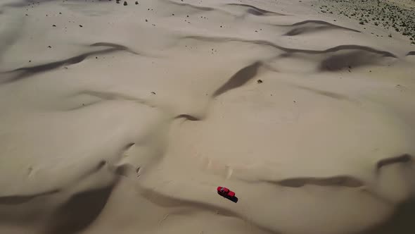 Top View of Cars Driving Through the Desert Sands in Kazakhstan