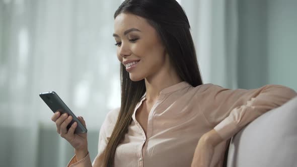 Beautiful Woman Enjoying Phone Application, Studying Modern Program Interface alt