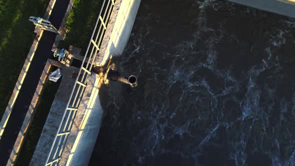 Pouring of Water Into Basin at Sewage Treatment Station alt