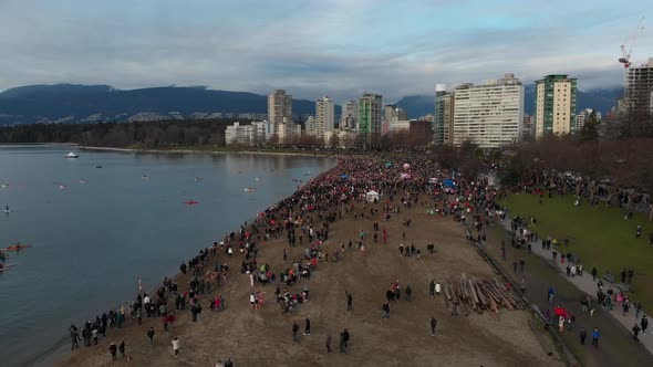 Various drone shots at English Bay near downtown Vancouver, BC during Polar Bear 2019 event alt