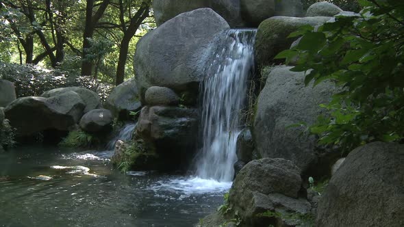 Stone And Small Waterfall