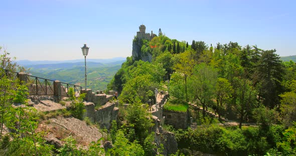 Shot of stone stairways leading upto Cesta tower along the Guaita fortress in San Marino, Italy. Old alt