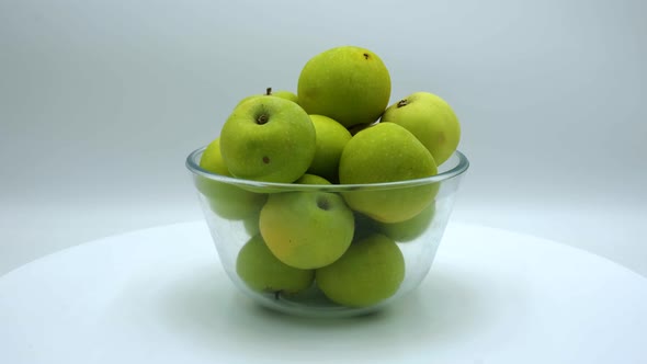 Green apples from the garden on a white background