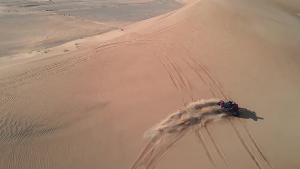 Biker Drifting on the Dunes