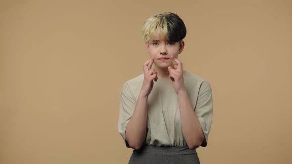 Portrait of Fashion Model Looking at Camera with Excitement Then Celebrating Her Victory Triumph alt