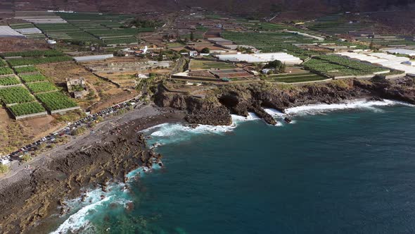 Tenerife a View of a Banana Plantation a Black Beach of Volcanic Sand on the Atlantic Ocean alt