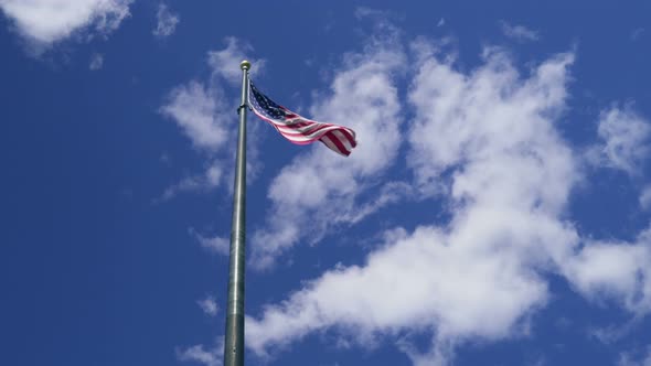  American Flag with Clouds Moving in the Background