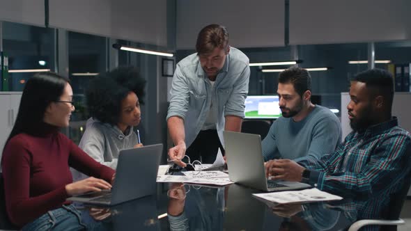Group of Diverse Office Workers Conferring in Modern Office alt