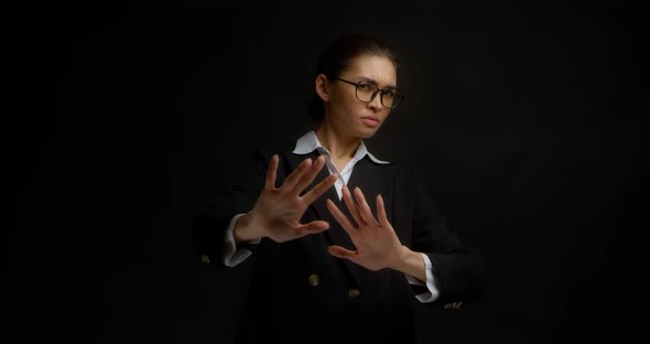 Business Woman Waves Her Hands Away Shows a No Gesture