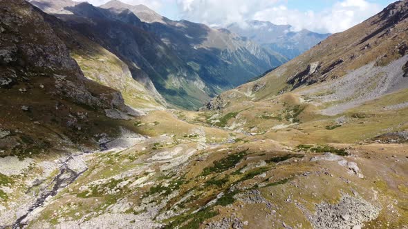Top View of Mountain Peaks and Gorge alt