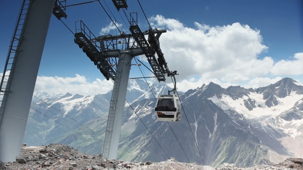 Cable Car With Cabins In The Mountains alt