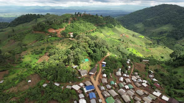 Aerial view of Pa kha village,  Houses in valley, Chiang Mai, Thailand by drone