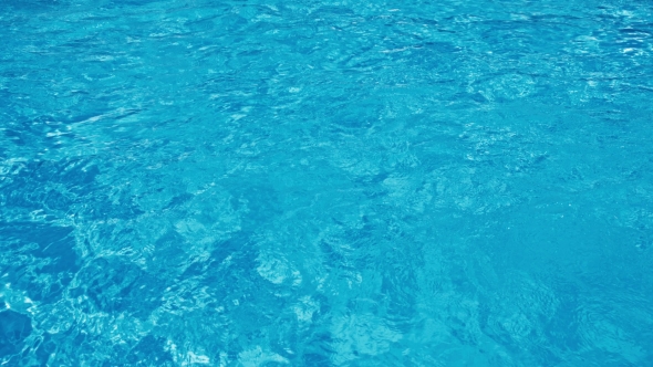 Blue Water Rippled Background In Swimming Pool