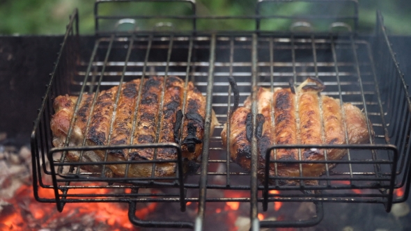 Grilled Meat On The Flaming Grill alt