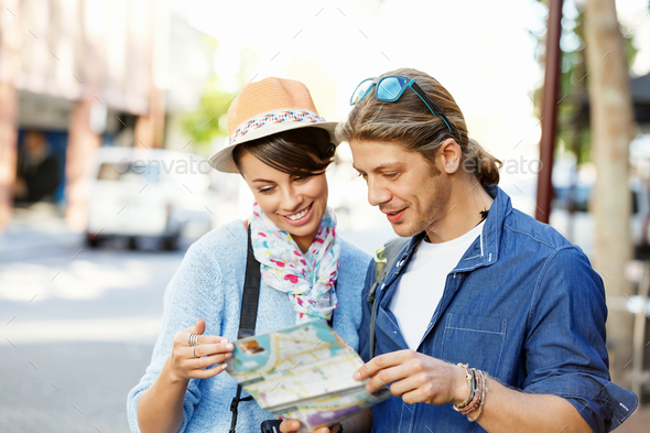 Girl and guy on the streets of a city - Stock Photo - Images