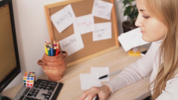 Woman Working On Her Computer alt