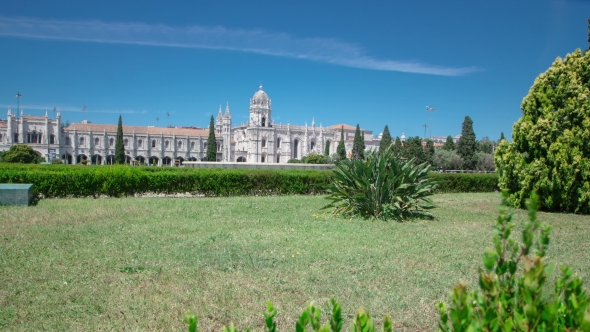 The Jeronimos Monastery Or Hieronymites Monastery With Lawn And Bushes Is Located In Lisbon alt