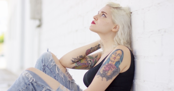 Sexy Sultry Young Woman With a Vampire Tattoo alt