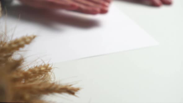 The Symbol Of Ukraine Is The Flag Of The Country In Blue And Yellow. The Hand Leads Flying The Flag alt