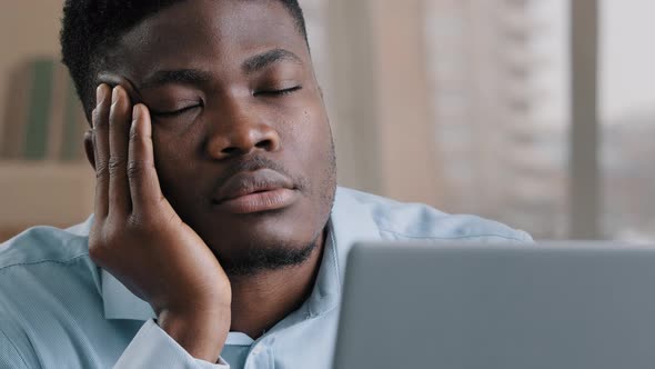 Sleepy Tired African Man Office Male Dreamer Businessman Has Sleeping Problem Napping Rest at Desk alt