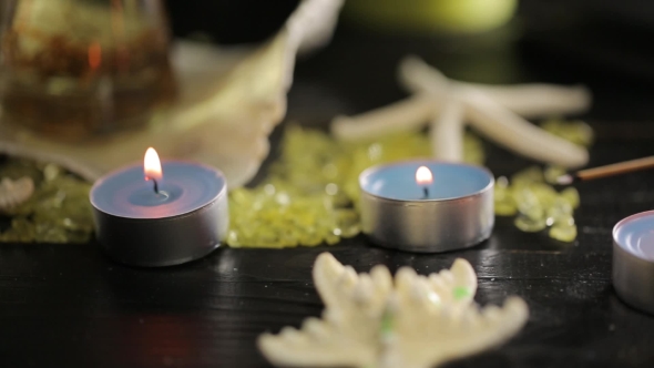 Green Candles In Spa Salon And And Massage Oil