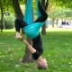 Girl In a Park Engaged In Aerial Yoga - VideoHive Item for Sale