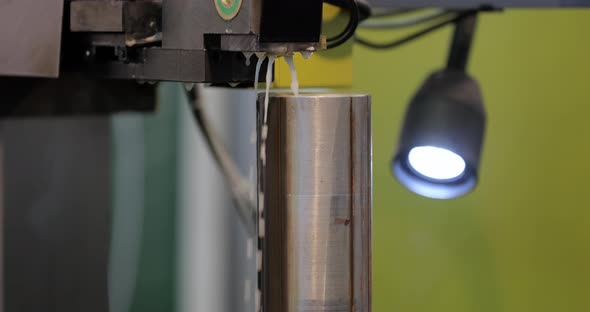 EDM CNC Machine While Cutting the Sample Work Pieces alt