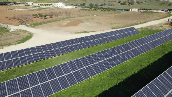 Fly over solar panels, Solar power plant in Lagos Portugal. Renewable Energy concept