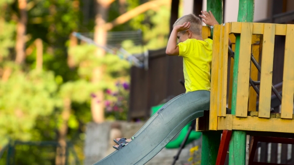 Children Playing on Slide