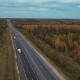 Flying Over The Road Among The Autumn Forest - VideoHive Item for Sale