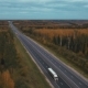 Aerial View Road And Autumn Forest - VideoHive Item for Sale