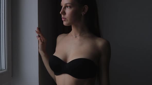 Woman in Black Lingerie Showing Body Shapes