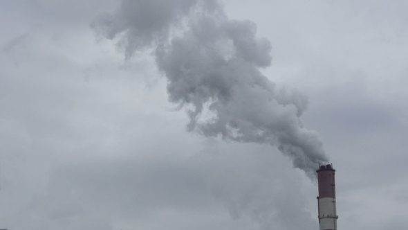 Smoking Pipes Of Thermal Power Plant On Cloudy Background