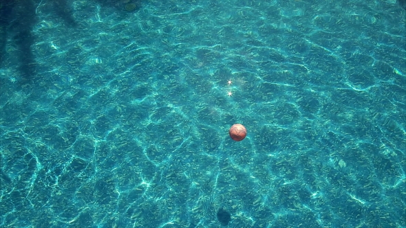 Beach Ball Floating In Pool