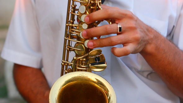 man playing saxophone