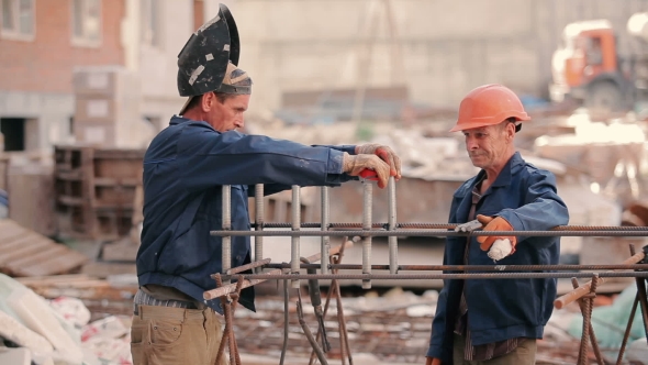 The Worker Measure The Distance Between The Pipes alt
