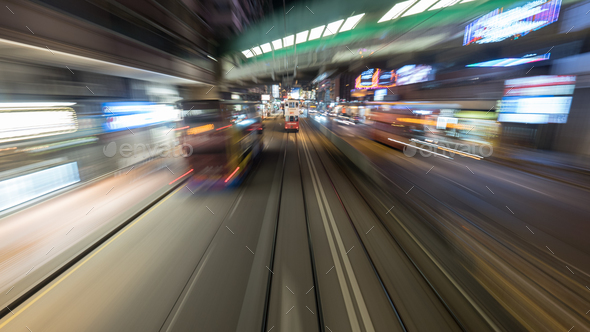 Traveling by tram in Hong Kong at night - Stock Photo - Images