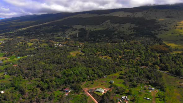 Beautiful 4k drone Maui upcountry on near Keokea looking towards Haleakala Mountain. February sky. alt