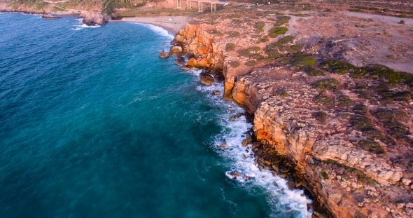 Beautiful Seashore With Clifs At Sunset