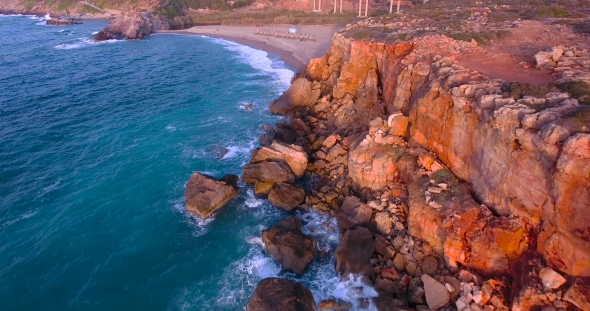 Beautiful Seashore With Clifs At Sunset