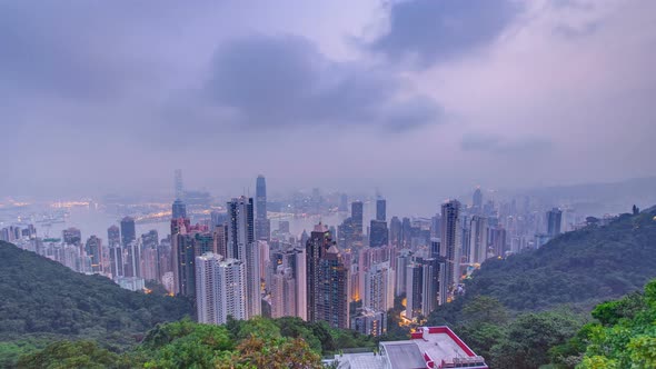 The Famous View of Hong Kong From Victoria Peak Night To Day Timelapse alt