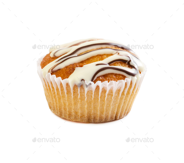 Muffin poured with liquid chocolate syrup - Stock Photo - Images