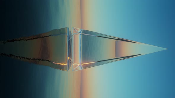 Vertical Ice Pyramid Rotating Over Calm Ocean Waters Loop