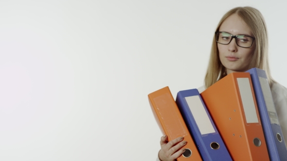 Unhappy Young Woman Holding Paper Folders