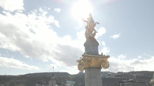 Flying over column of freedom in the center of Tbilisi, Georgia alt