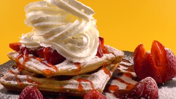 Belgian waffles with strawberry, sweet strawberry topping, whipped cream and powdered sugar  alt