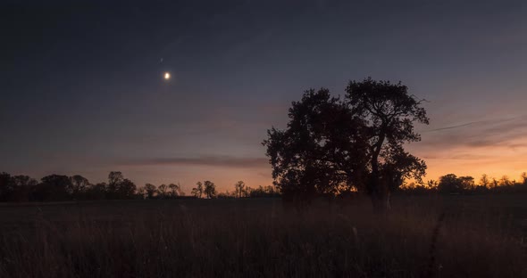 Crescent Moon Field Time Lapse Near Road Traffic Day To Night